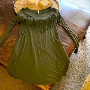 Green long sleeve dress with fringe.